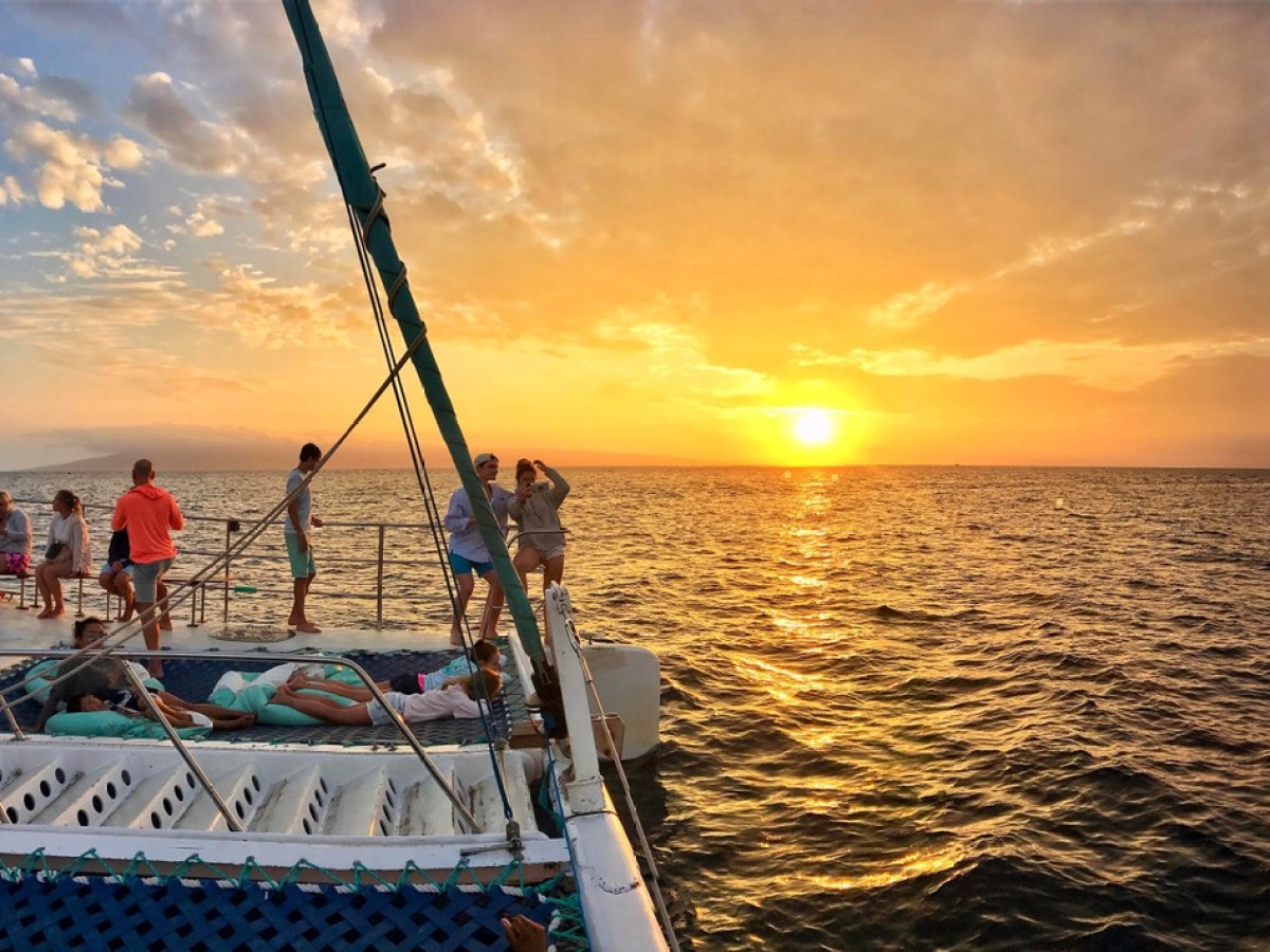 a boat on a beach near a body of water